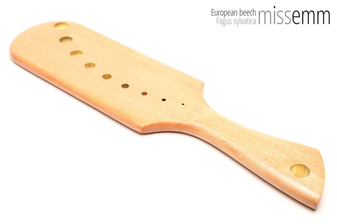 Unique handcrafted spanking toys | Wooden paddle | By kink artisan Miss Emm | Made from European beech with brass details.