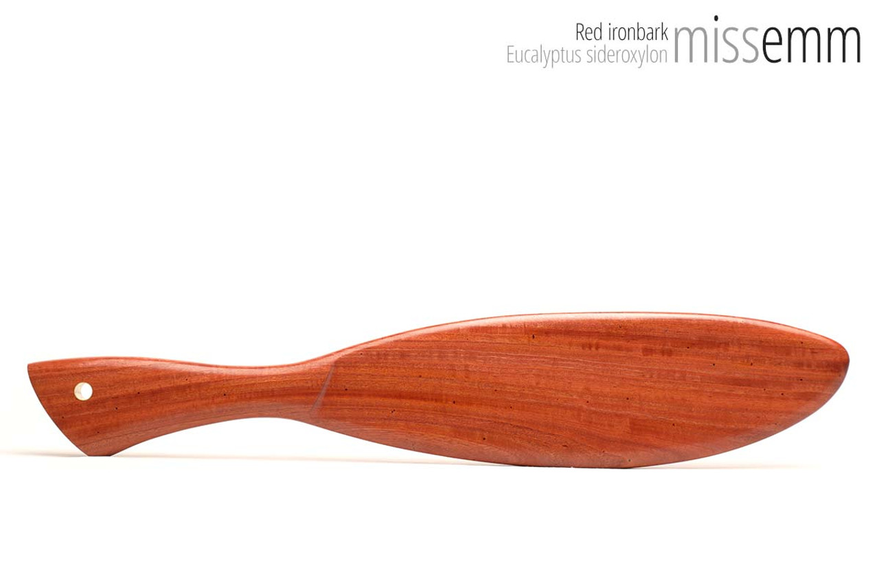 Unique handcrafted spanking toys | Wooden paddle | By kink artisan Miss Emm | Made from red ironbark with brass details.