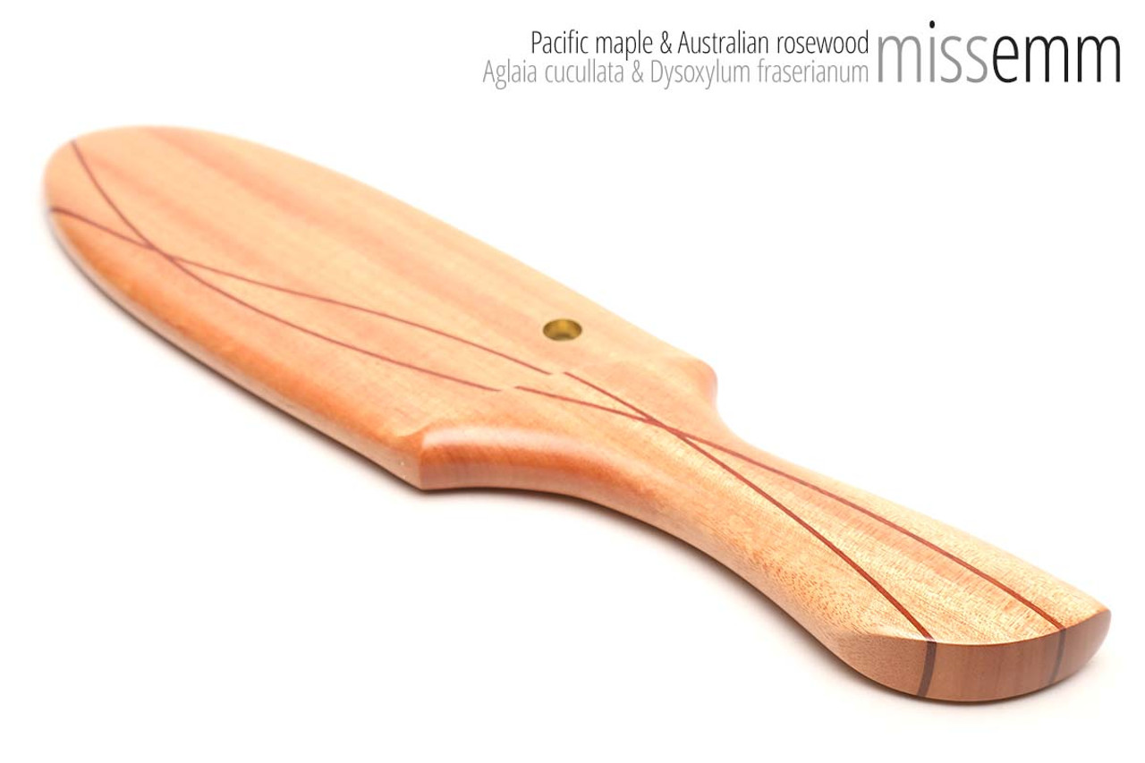 Unique handcrafted spanking toys | Wooden paddle | By kink artisan Miss Emm | Made from Queensland maple with brass details.