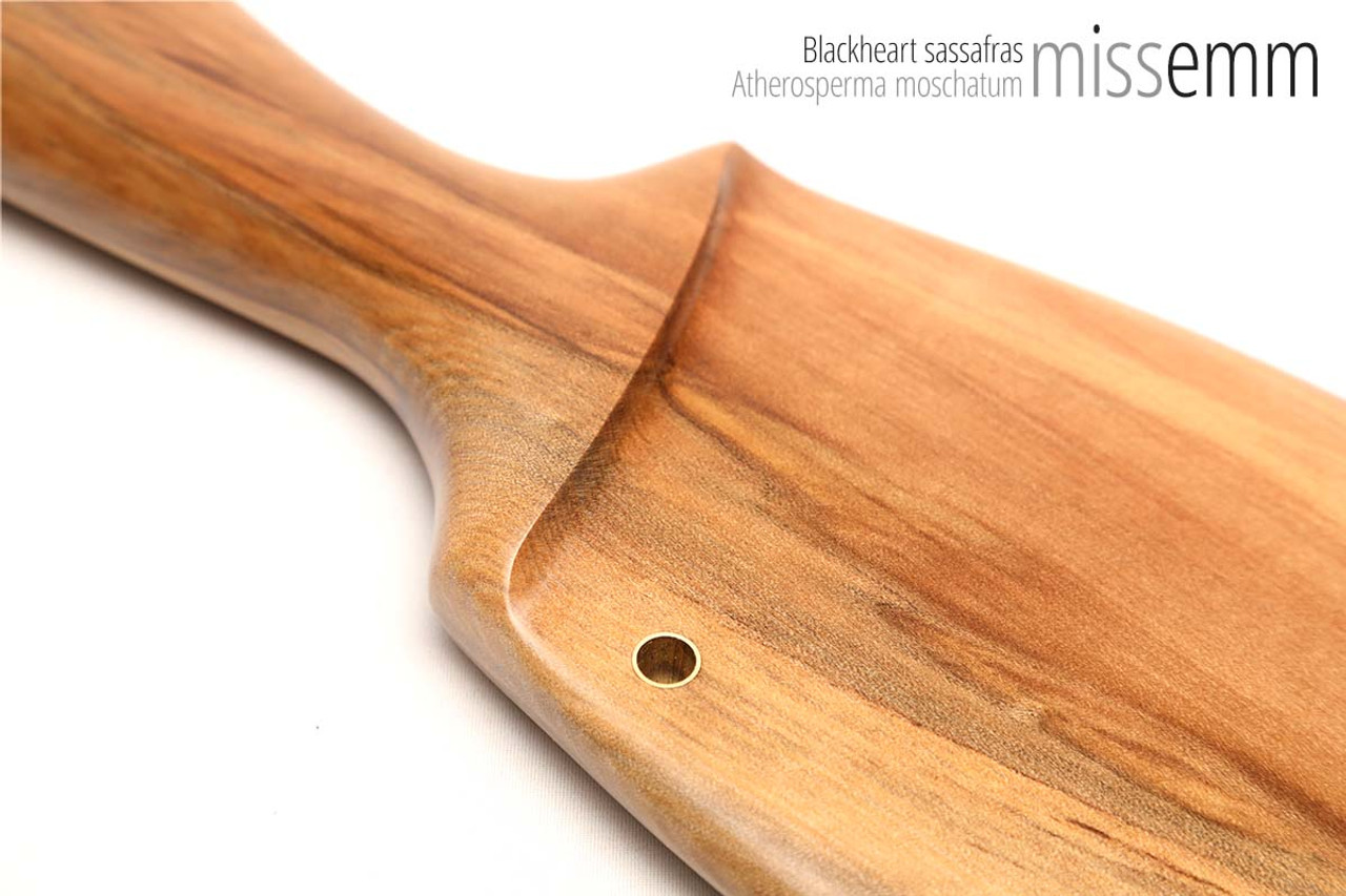 Unique handcrafted spanking toys | Wooden paddle | By kink artisan Miss Emm | Made from blackheart sassafras with brass details.