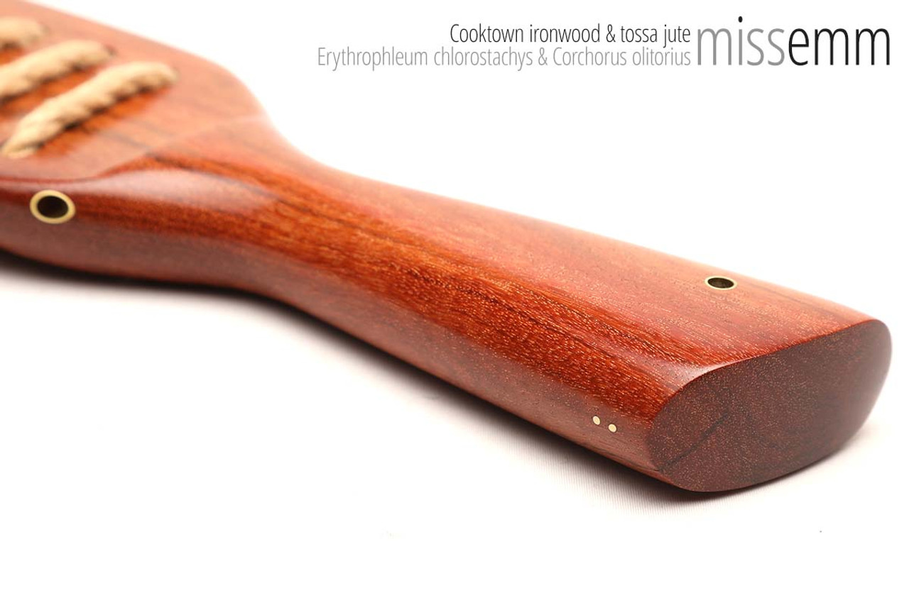 Unique handcrafted spanking toys | Wooden paddle | By kink artisan Miss Emm | Made from Cooktown ironwood with brass details.