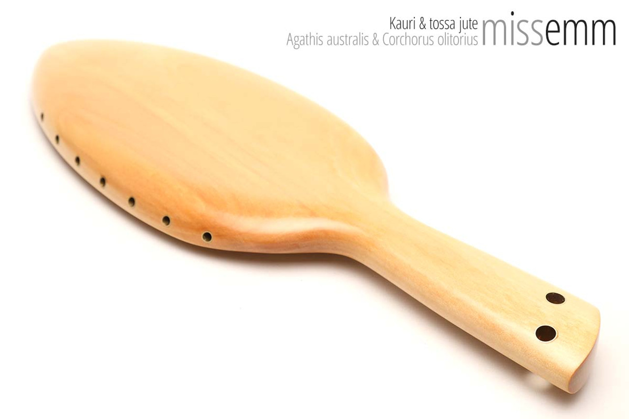 Unique handcrafted spanking toys | Wooden paddle | By kink artisan Miss Emm | Made from kauri with brass details.