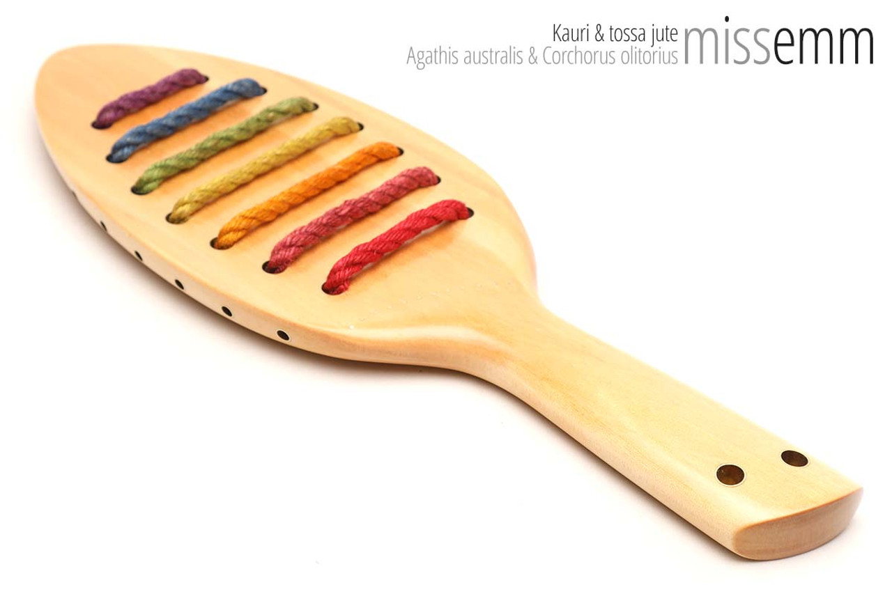 Unique handcrafted spanking toys | Wooden paddle | By kink artisan Miss Emm | Made from kauri with brass details.