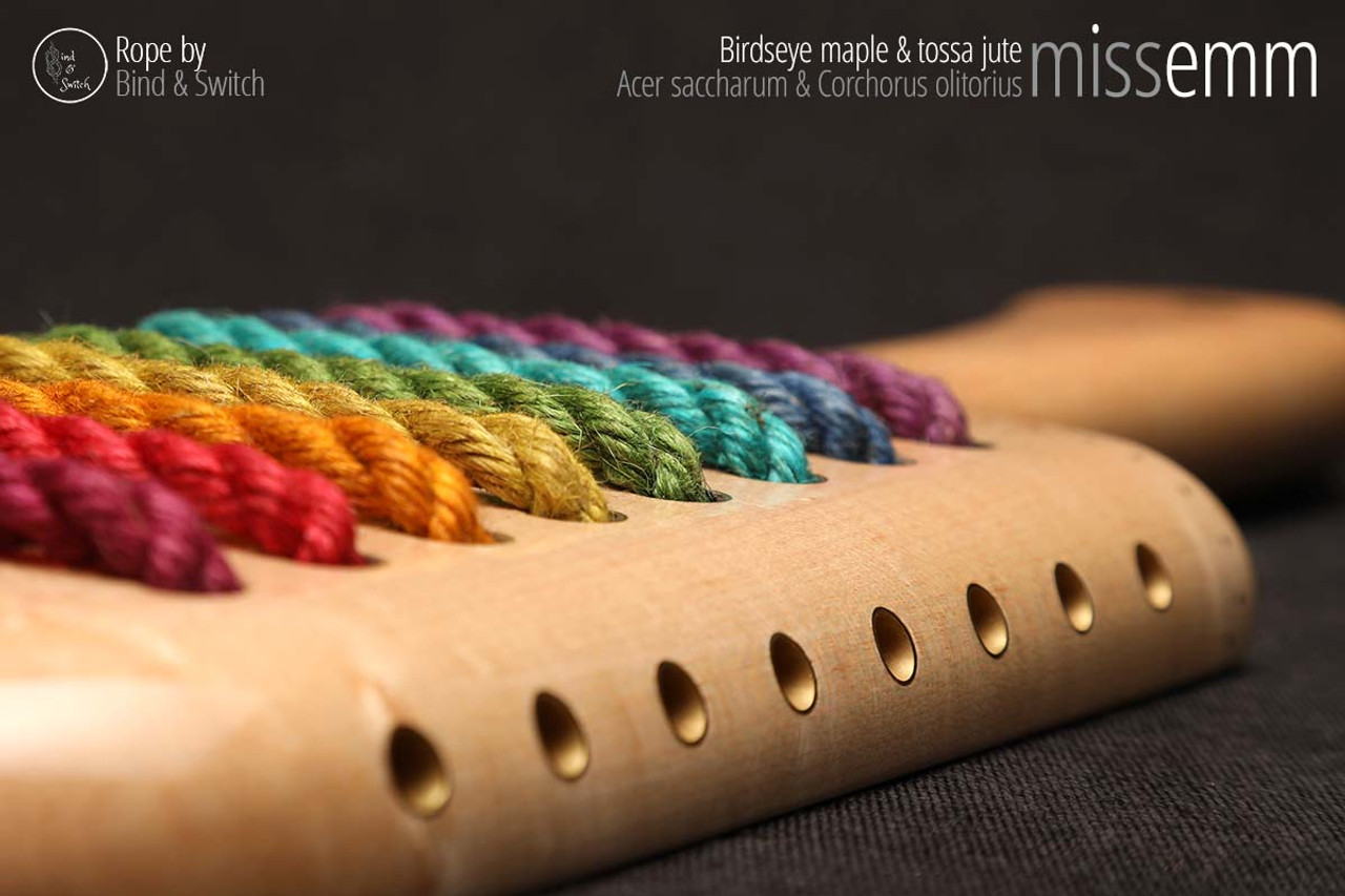 Unique handcrafted spanking toys | Wooden paddle | By kink artisan Miss Emm | Made from birdseye maple and jute with brass details.