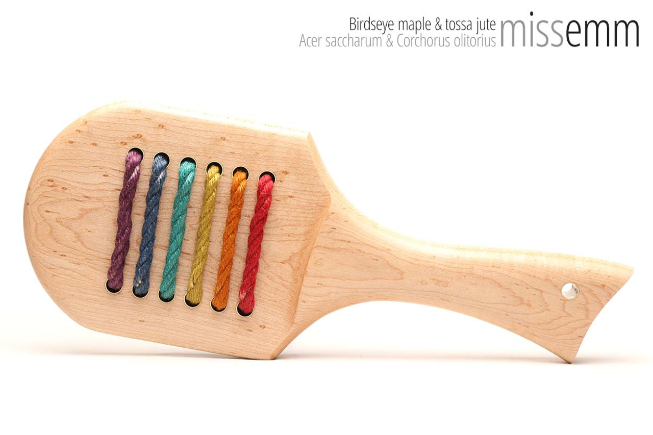 Unique handcrafted spanking toys | Wooden paddle | By kink artisan Miss Emm | Made from birdseye maple and jute with brass details.