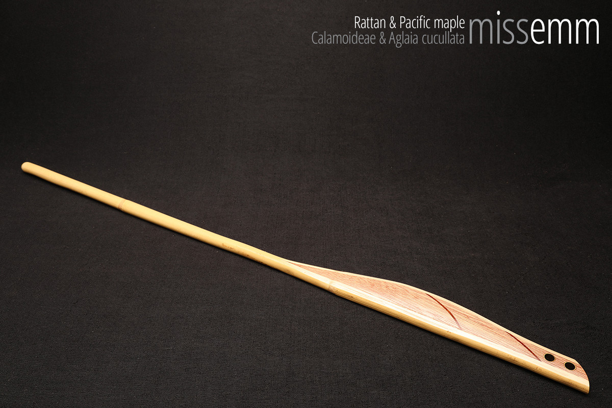 Handmade bdsm toys | Rattan cane | By kink artisan Miss Emm | The cane shaft is rattan cane and the handle has been handcrafted from Pacific maple with brass details.