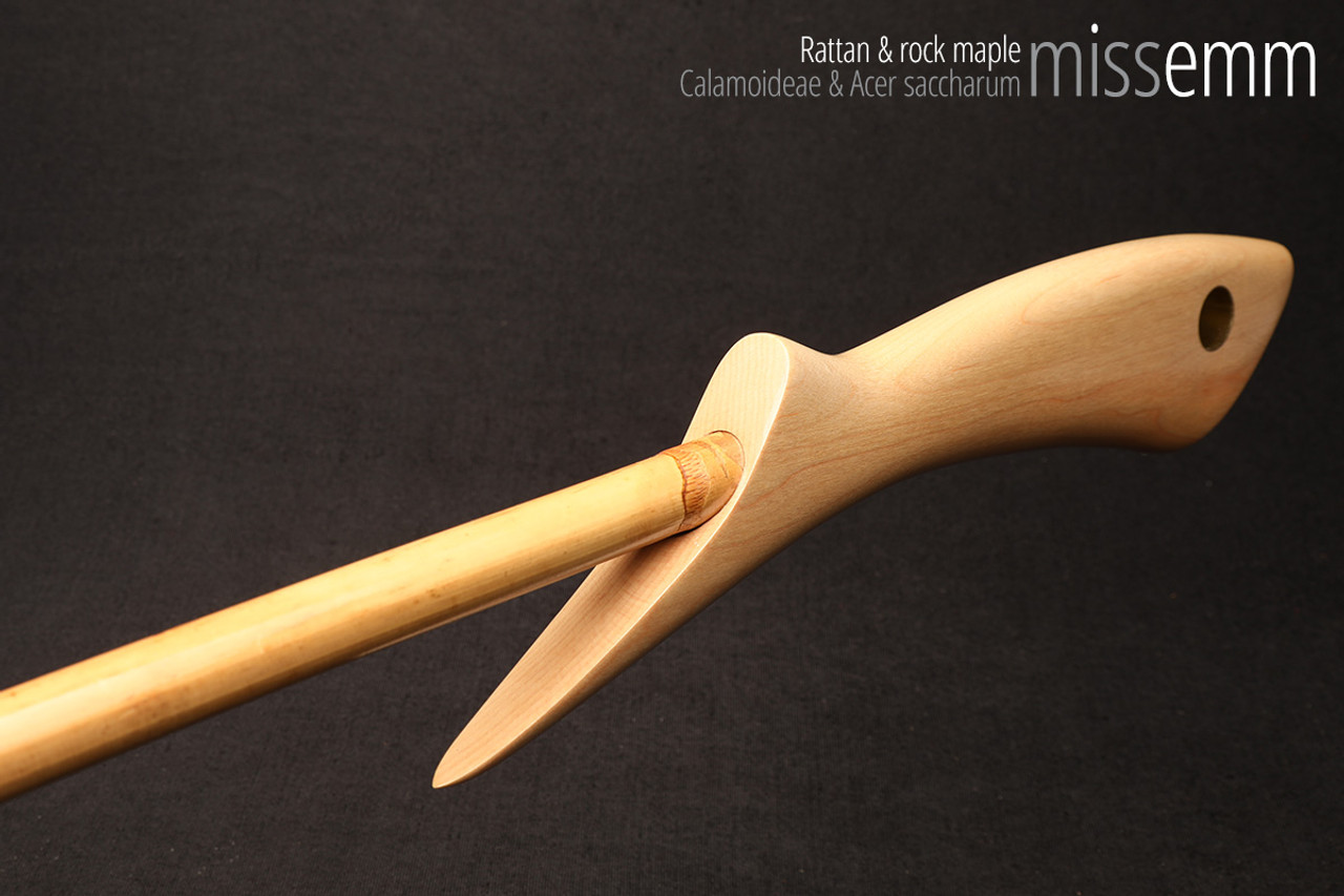 Handmade bdsm toys | Rattan cane | By kink artisan Miss Emm | The cane shaft is rattan cane and the handle has been handcrafted from rock maple with brass details.