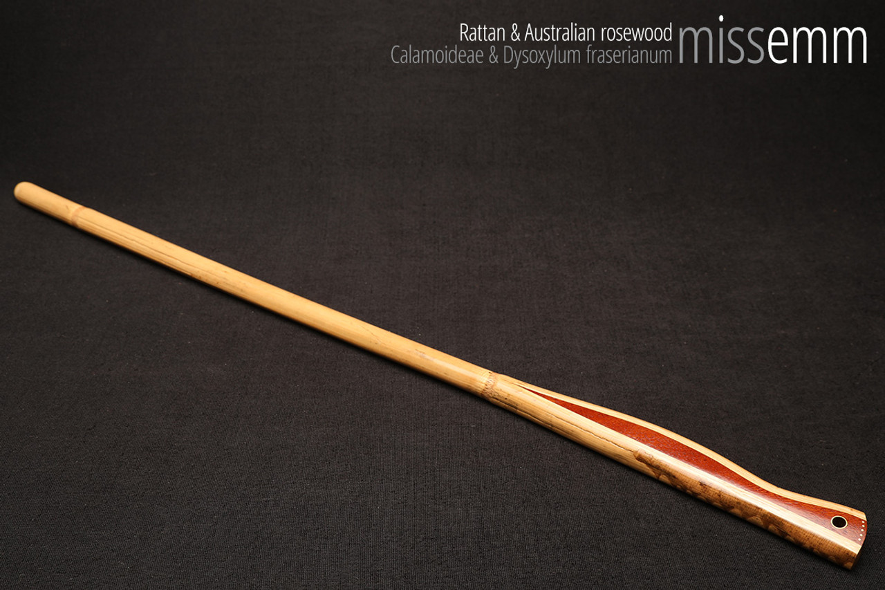 Handmade bdsm toys | Rattan cane | By kink artisan Miss Emm | The cane shaft is rattan cane and the handle has been handcrafted from Australian rosewood with brass details.