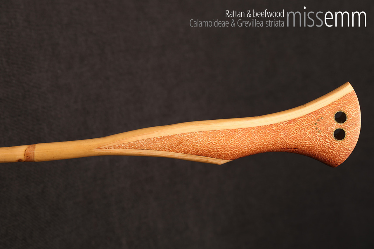 Handmade bdsm toys | Rattan cane | By kink artisan Miss Emm | The cane shaft is rattan cane and the handle has been handcrafted from beefwood with brass details.