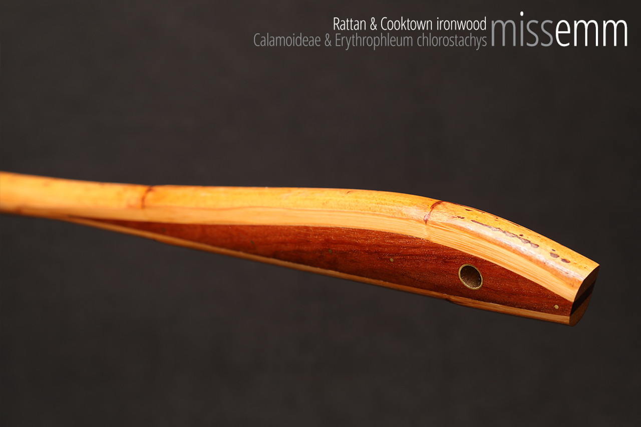 Handmade bdsm toys | Rattan cane | By kink artisan Miss Emm | The cane shaft is rattan cane and the handle has been handcrafted from Cooktown ironwood with brass details.