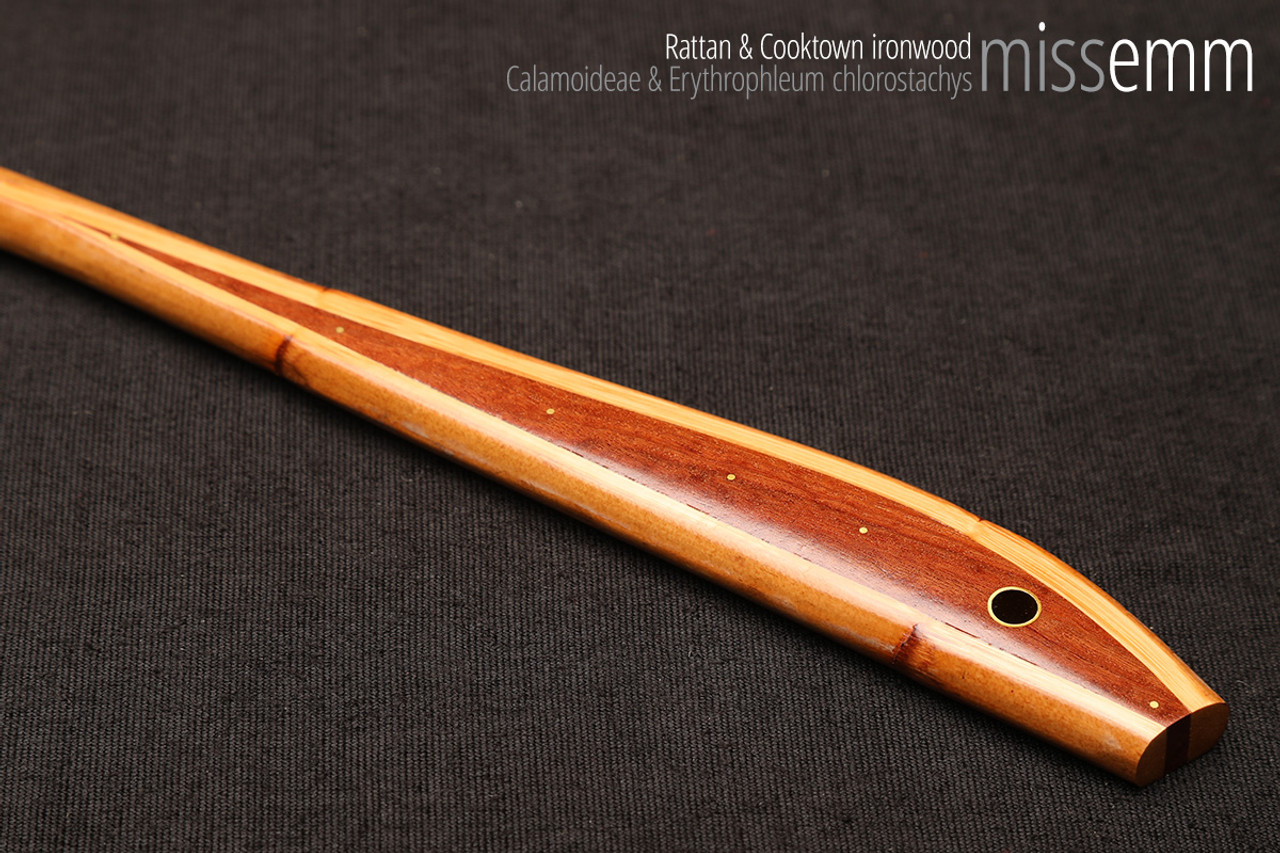 Handmade bdsm toys | Rattan cane | By kink artisan Miss Emm | The cane shaft is rattan cane and the handle has been handcrafted from Cooktown ironwood with brass details.