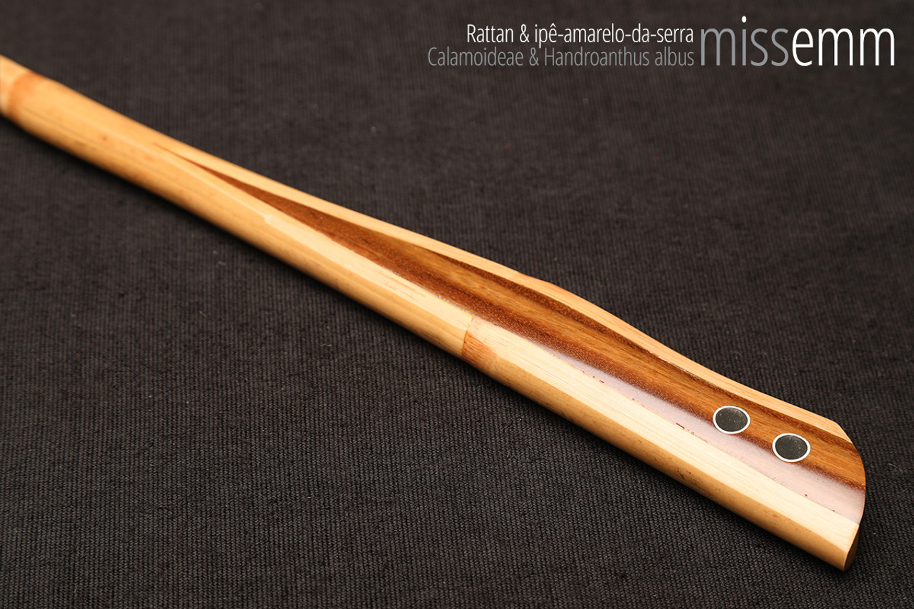 Handmade bdsm toys | Rattan cane | By kink artisan Miss Emm | The cane shaft is rattan cane and the handle has been handcrafted from ipê amarelo da serrawith aluminium details.