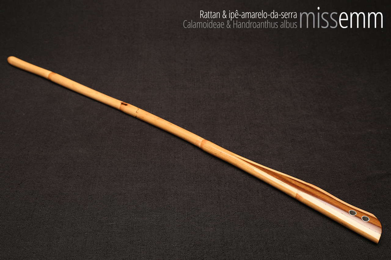 Handmade bdsm toys | Rattan cane | By kink artisan Miss Emm | The cane shaft is rattan cane and the handle has been handcrafted from ipê amarelo da serra with aluminium details.