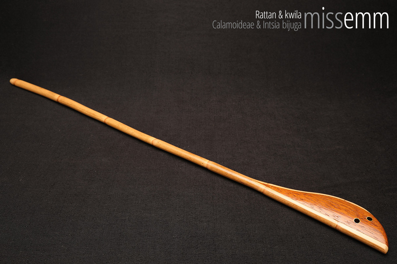 Handmade bdsm toys | Rattan cane | By kink artisan Miss Emm | The cane shaft is rattan cane and the handle has been handcrafted from kwila with brass details.