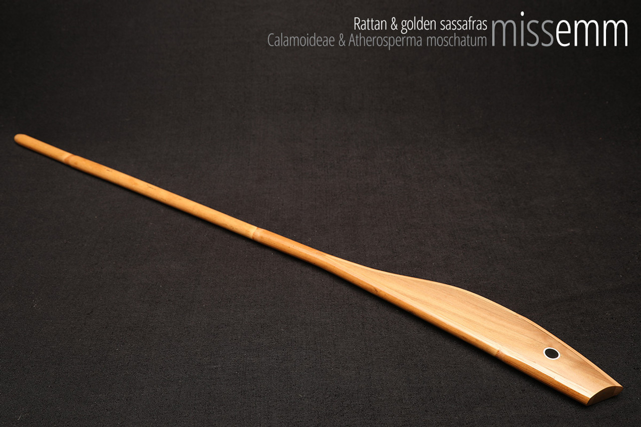 Handmade spanking toys | Rattan cane | By kink artisan Miss Emm | The cane shaft is rattan cane and the handle has been handcrafted from sassafras with aluminium details.