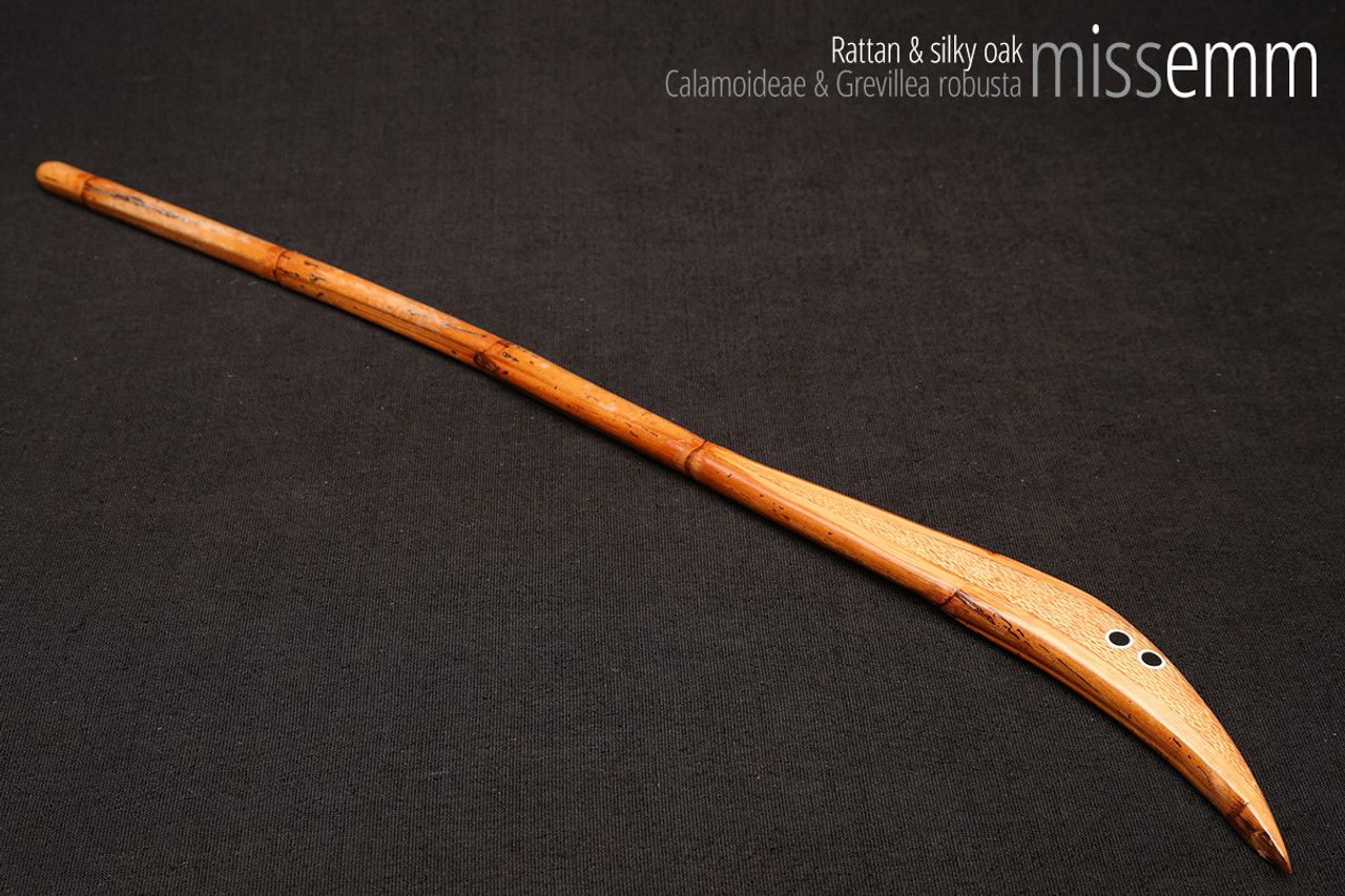 Handmade bdsm toys | Rattan cane | By kink artisan Miss Emm | The cane shaft is rattan cane and the handle has been handcrafted from silky oak with aluminium details.