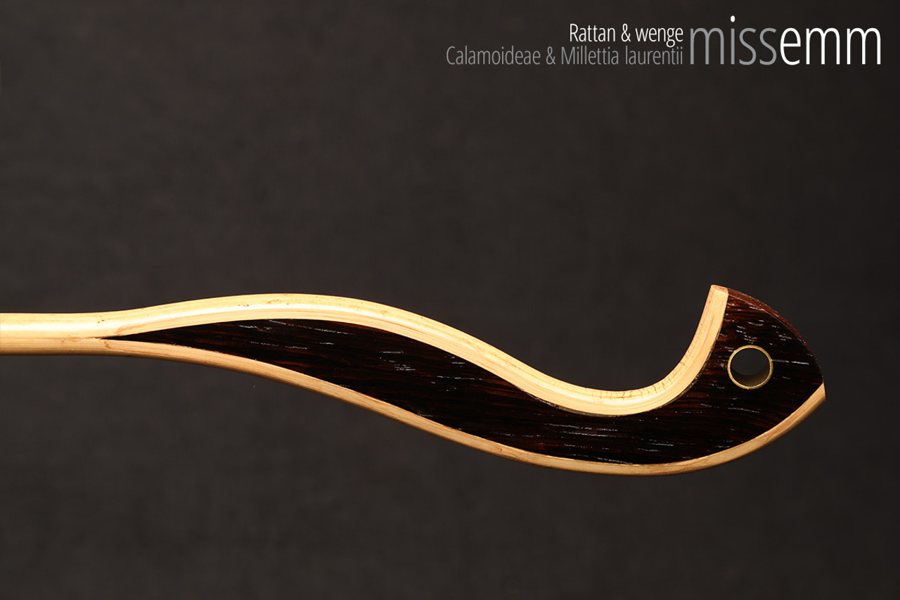 Handmade bdsm toys | Rattan cane | By kink artisan Miss Emm | The cane shaft is rattan cane and the handle has been handcrafted from wenge with brass details.