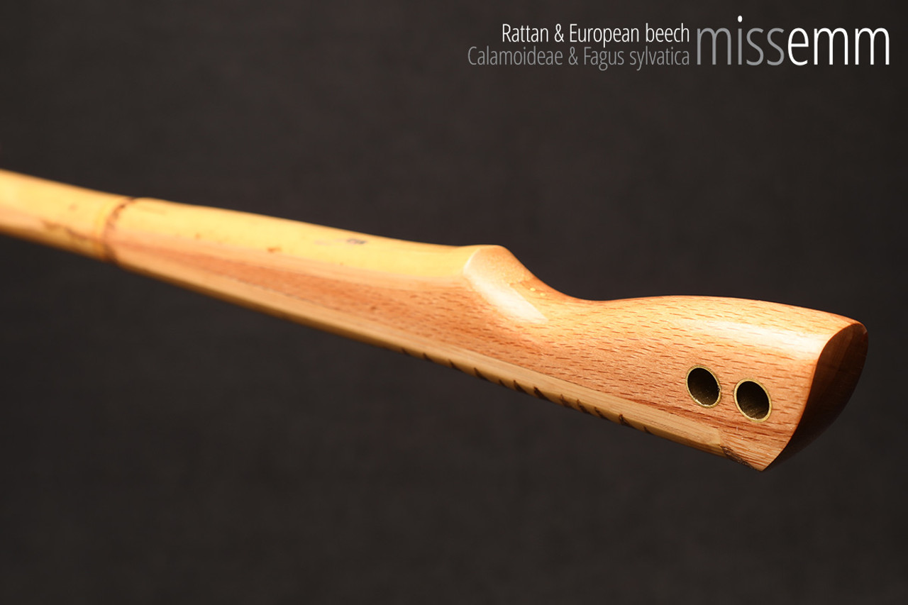 Unique spanking toys | Rattan pane (flat bladed cane) | By kink artisan Miss Emm | The shaft is made from rattan cane and the handle has been handcrafted from beech with brass details.