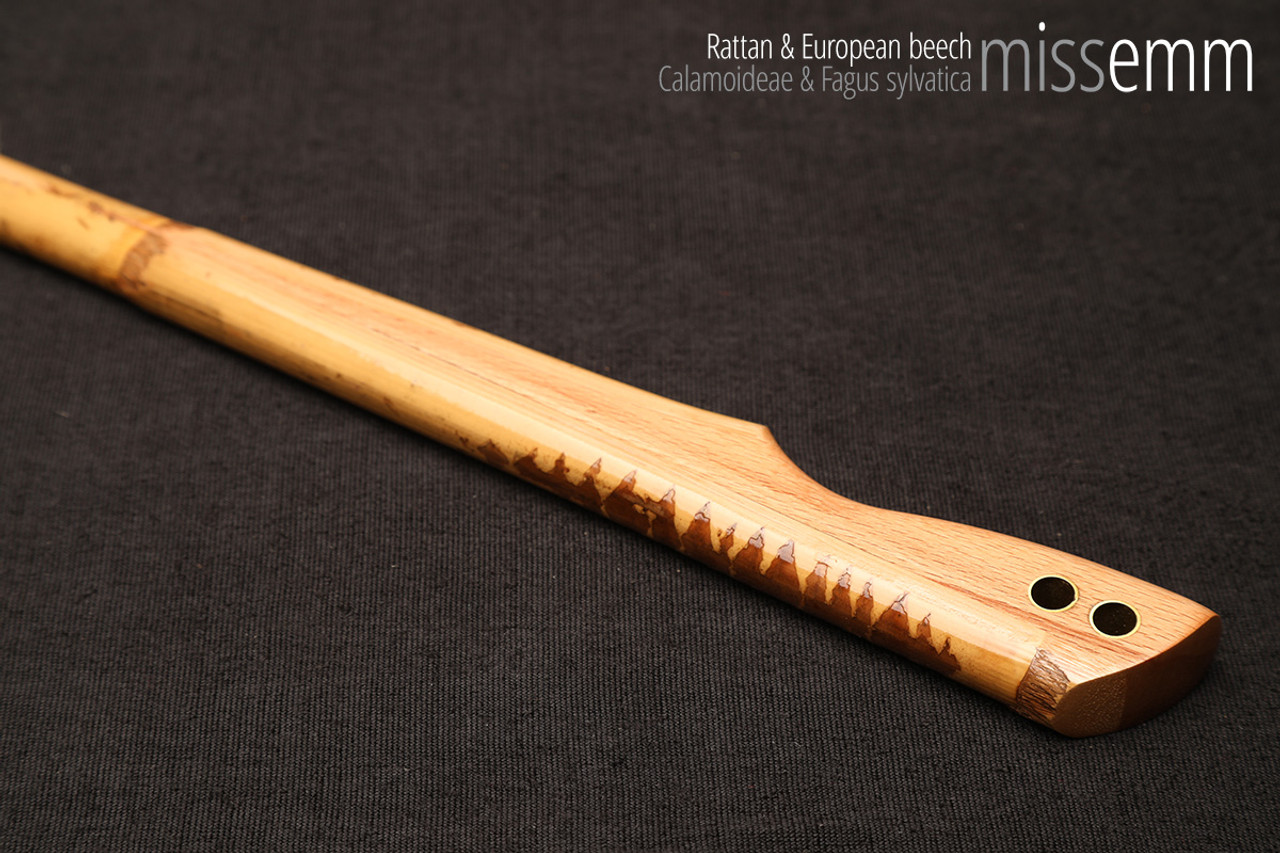 Unique spanking toys | Rattan pane (flat bladed cane) | By kink artisan Miss Emm | The shaft is made from rattan cane and the handle has been handcrafted from beech with brass details.