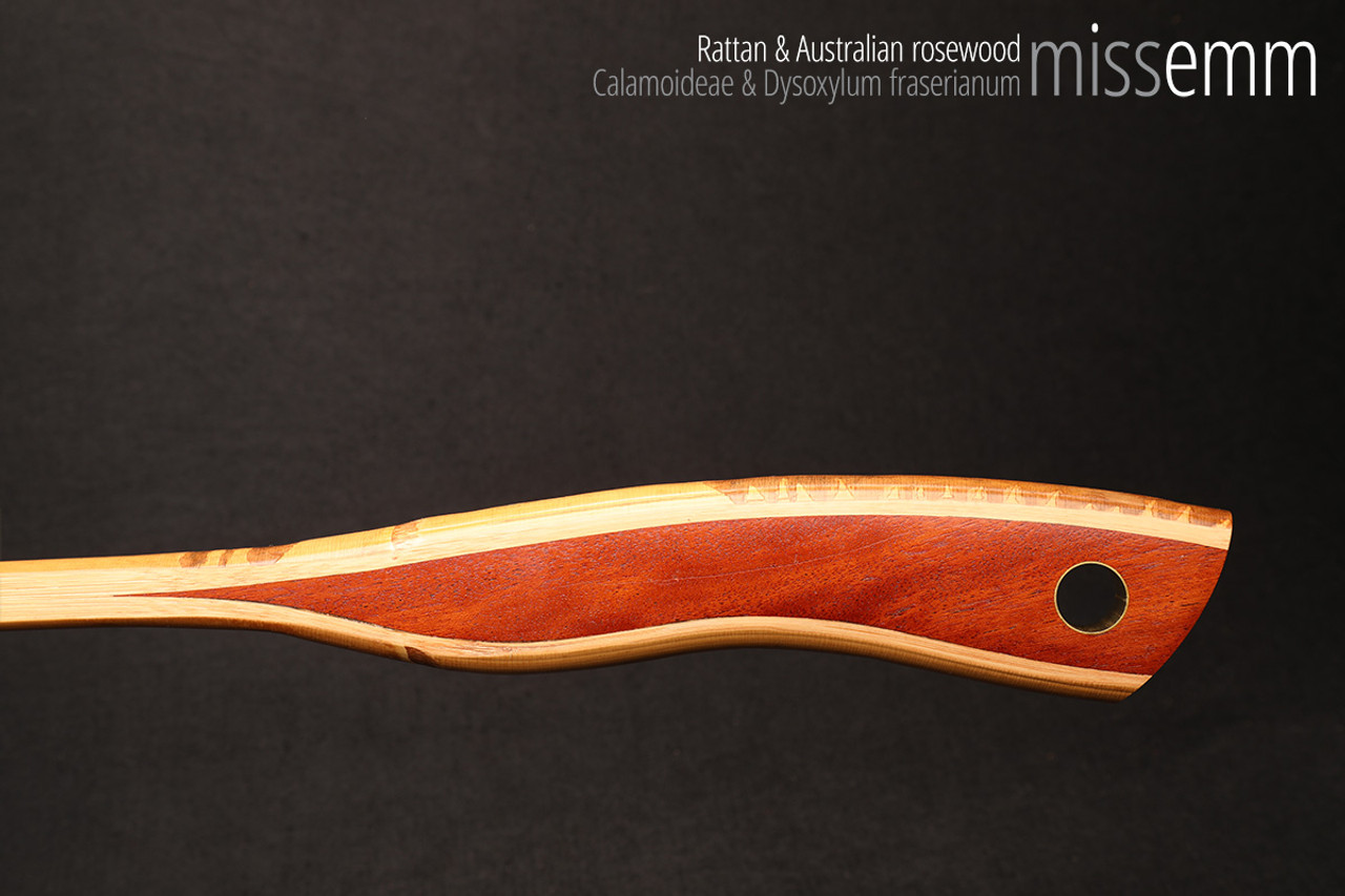 Unique spanking toys | Rattan pane (flat bladed cane) | By kink artisan Miss Emm | The shaft is made from rattan cane and the handle has been handcrafted from Australian rosewood with brass details.