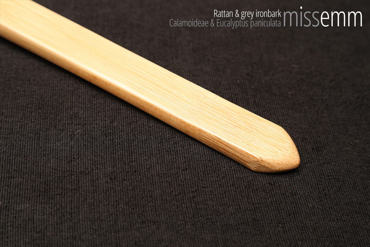 Unique spanking toys | Rattan pane (flat bladed cane) | By kink artisan Miss Emm | The shaft is made from rattan cane and the handle has been handcrafted from grey ironbark with brass details.