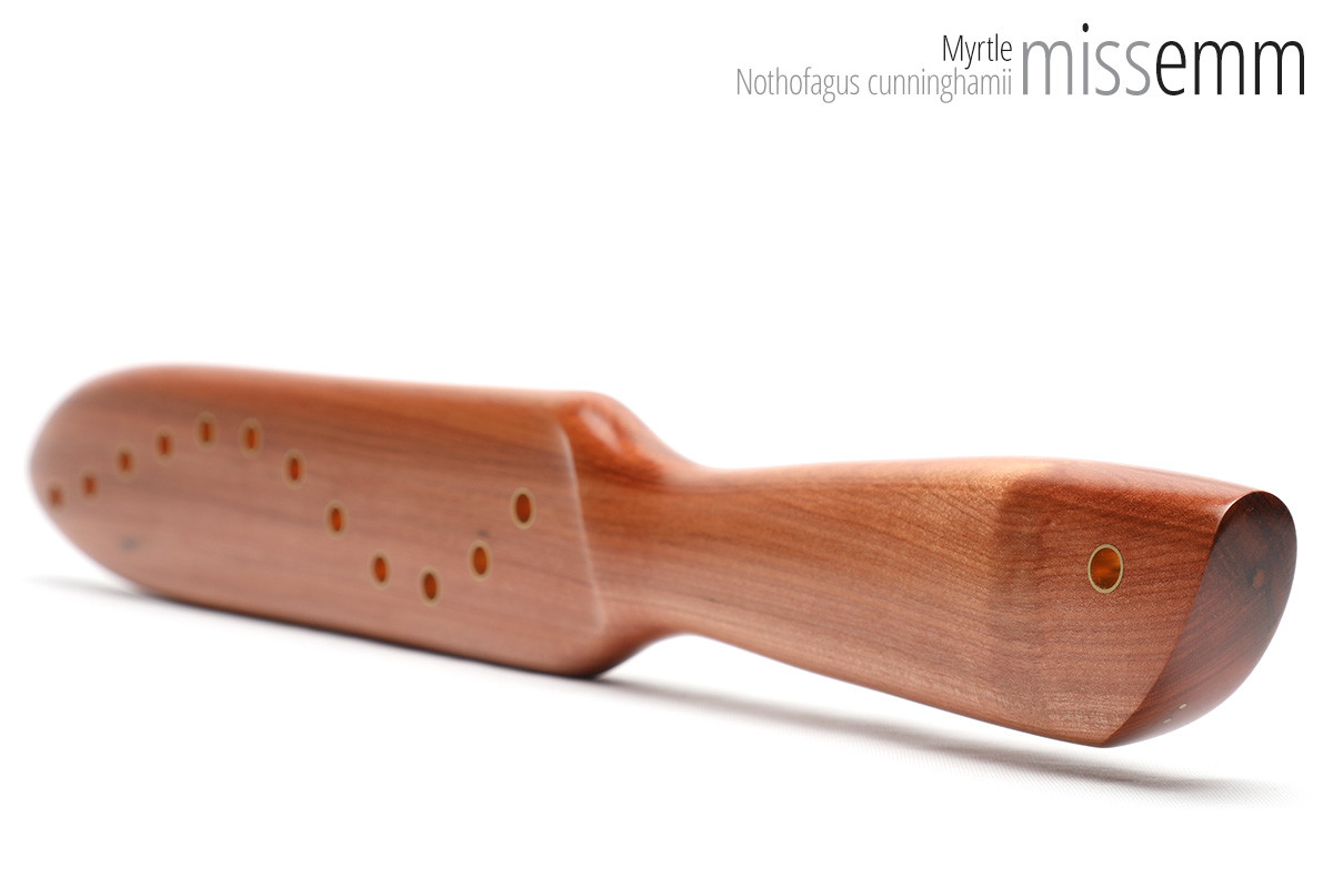 Unique handcrafted spanking toys | Wooden paddle | By kink artisan Miss Emm | Made from myrtle with brass details.