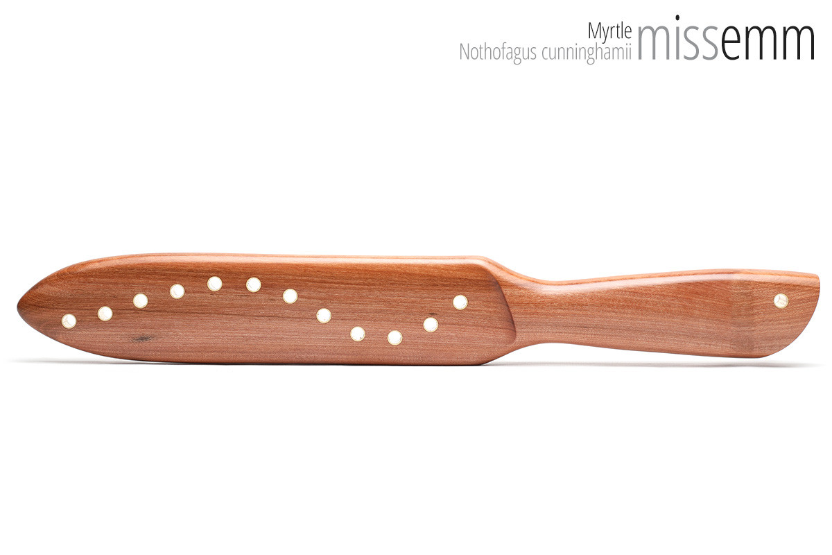 Unique handcrafted spanking toys | Wooden paddle | By kink artisan Miss Emm | Made from myrtle with brass details.