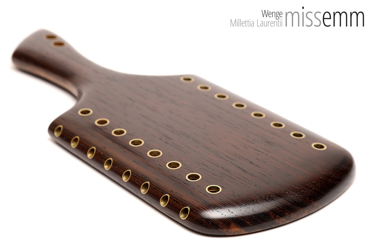 Unique spanking toys | Wood & rope paddle | By kink artisan Miss Emm | Made from wenge and tossa jute, this rainbow rope paddle has brass fittings, anodised alumnium screws and a Danish oil finish. It is a heavy and thuddy spanking implement, perfect for some seriously stylish impact play.