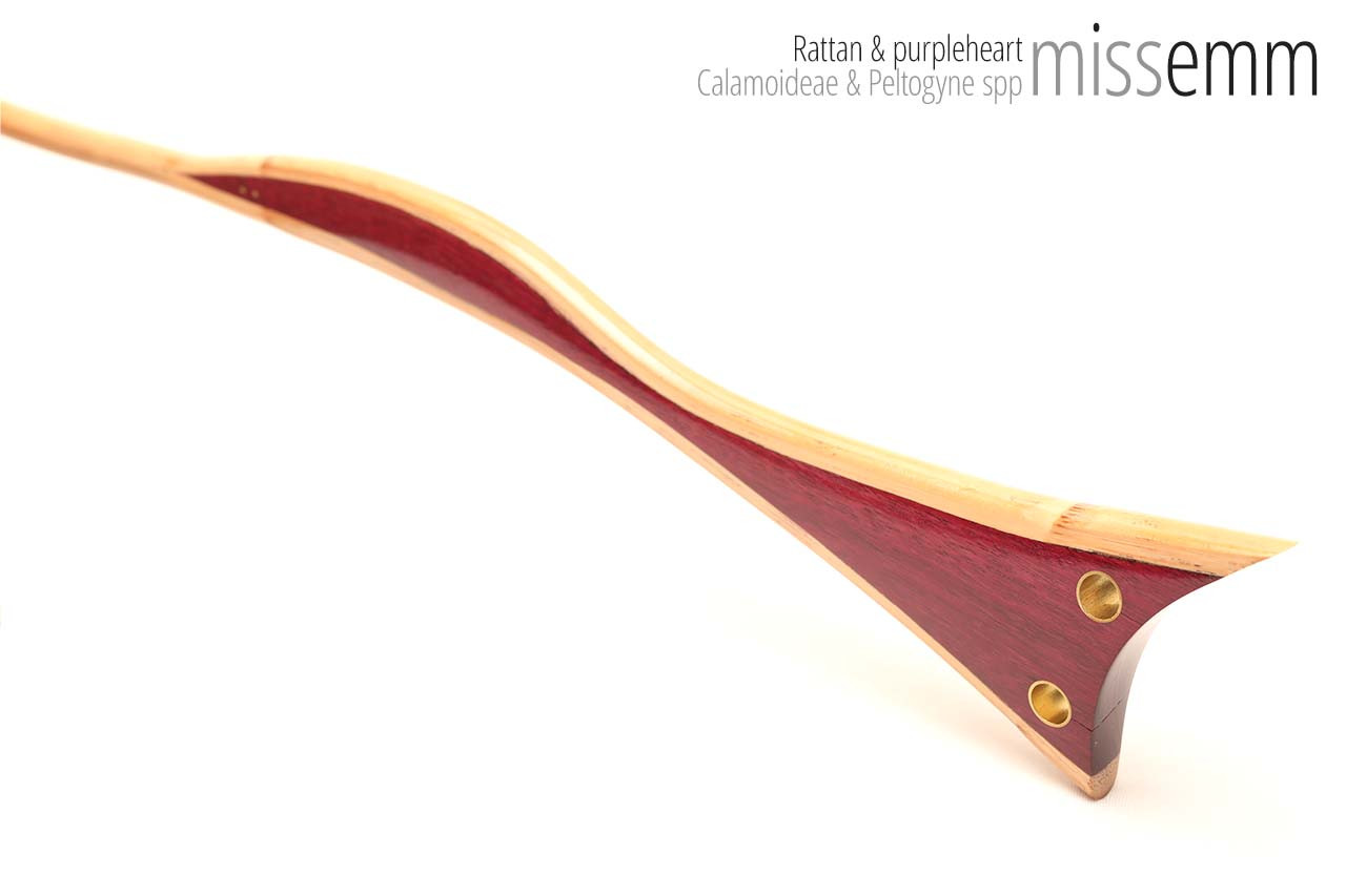 Handmade bdsm toys | Rattan cane | By kink artisan Miss Emm | The cane shaft is rattan cane and the handle has been handcrafted from purpleheart with brass details.