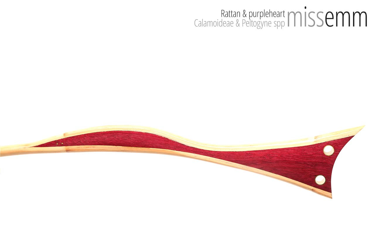 Handmade bdsm toys | Rattan cane | By kink artisan Miss Emm | The cane shaft is rattan cane and the handle has been handcrafted from purpleheart with brass details.