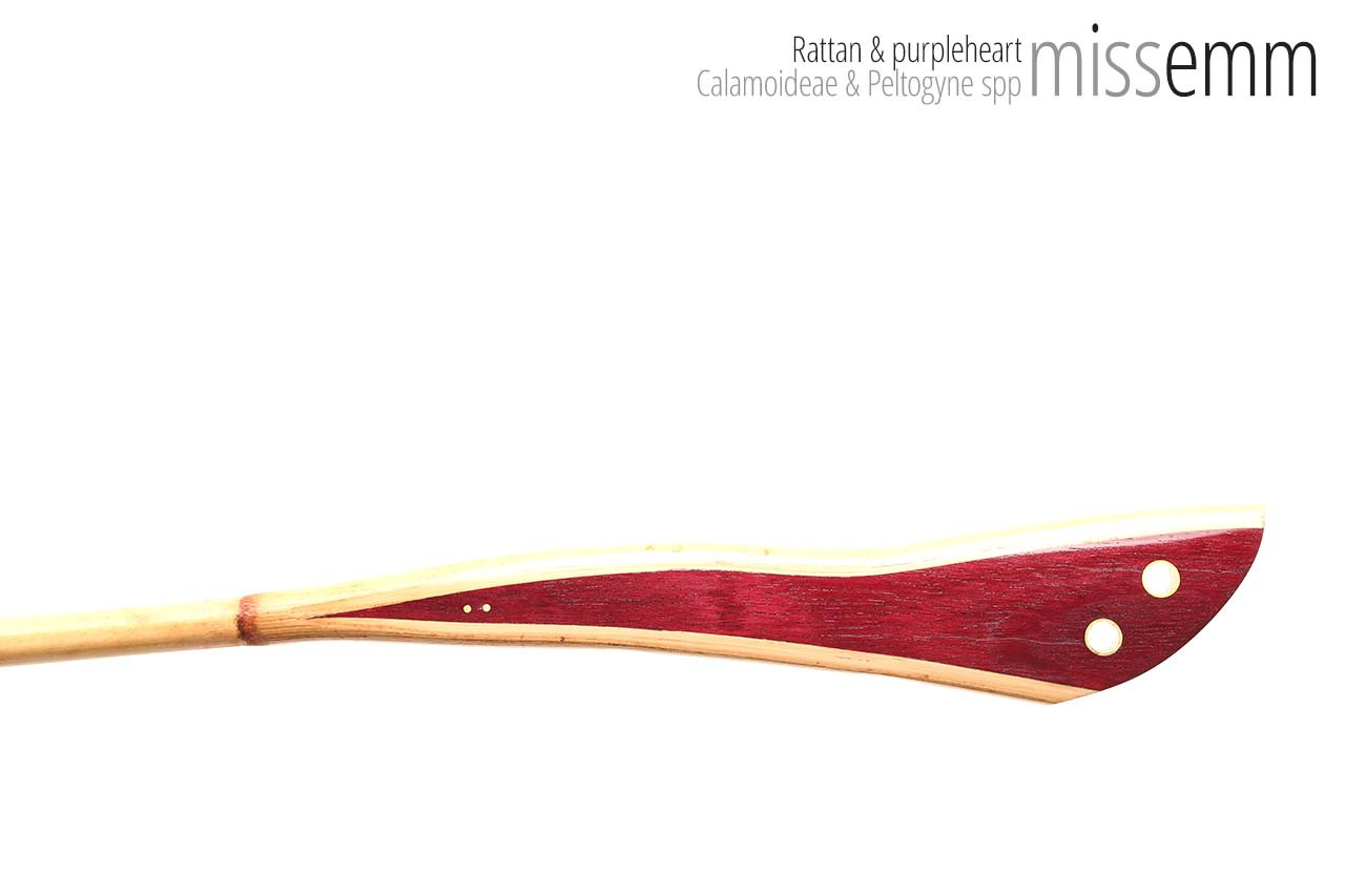 Handmade bdsm toys | Rattan cane | By kink artisan Miss Emm | The cane shaft is rattan cane and the handle has been handcrafted from purpleheart with brass details.