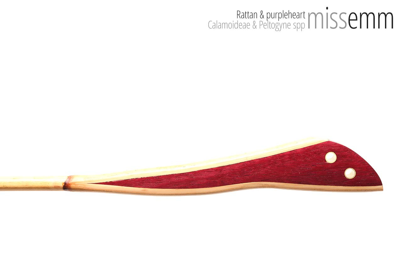 Handmade bdsm toys | Rattan cane | By kink artisan Miss Emm | The cane shaft is rattan cane and the handle has been handcrafted from purpleheart with brass details.