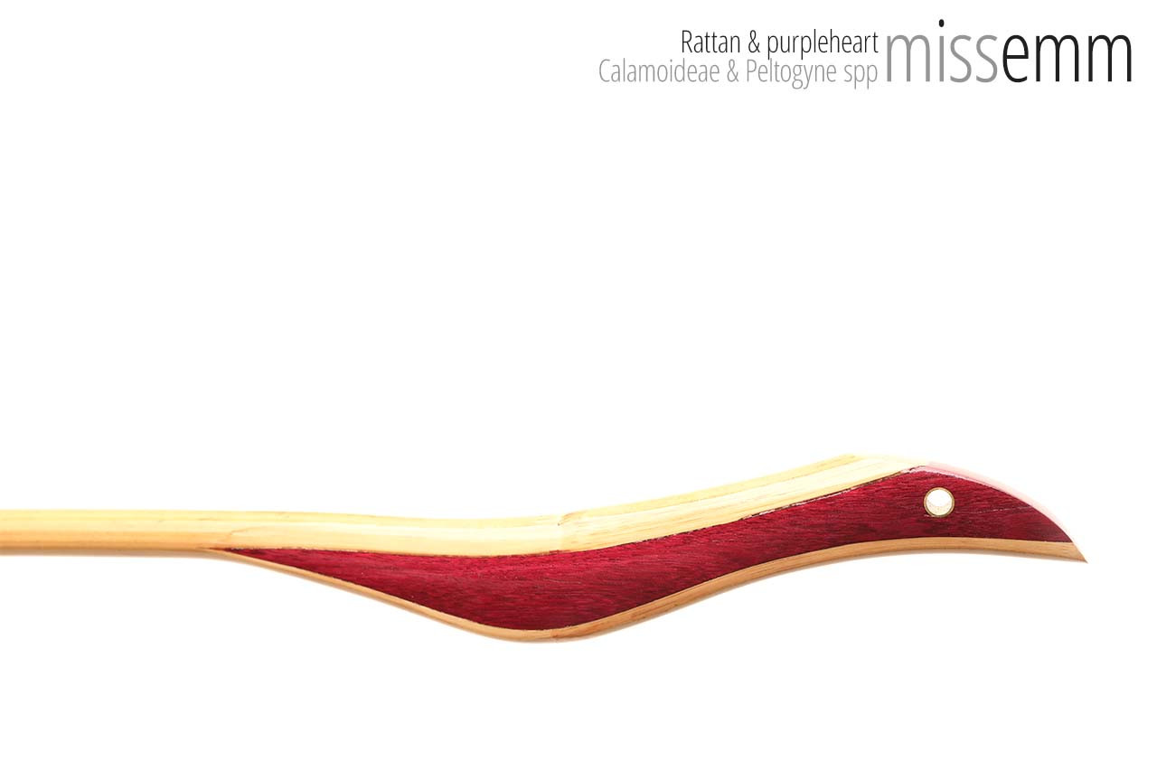 Handmade bdsm toys | Rattan cane | By kink artisan Miss Emm | The cane shaft is rattan cane and the handle has been handcrafted from purpleheart with brass details.