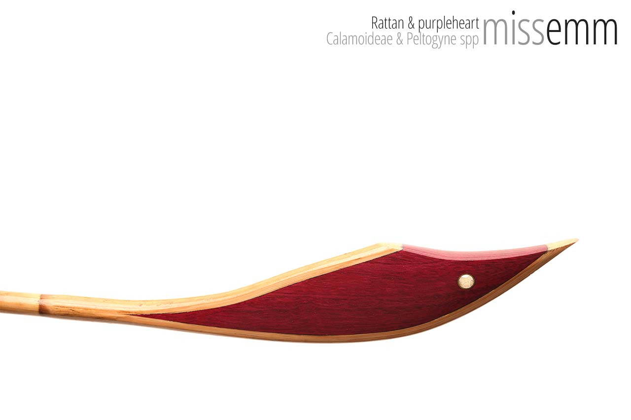 Handmade bdsm toys | Rattan cane | By kink artisan Miss Emm | The cane shaft is rattan cane and the handle has been handcrafted from purpleheart with brass details.