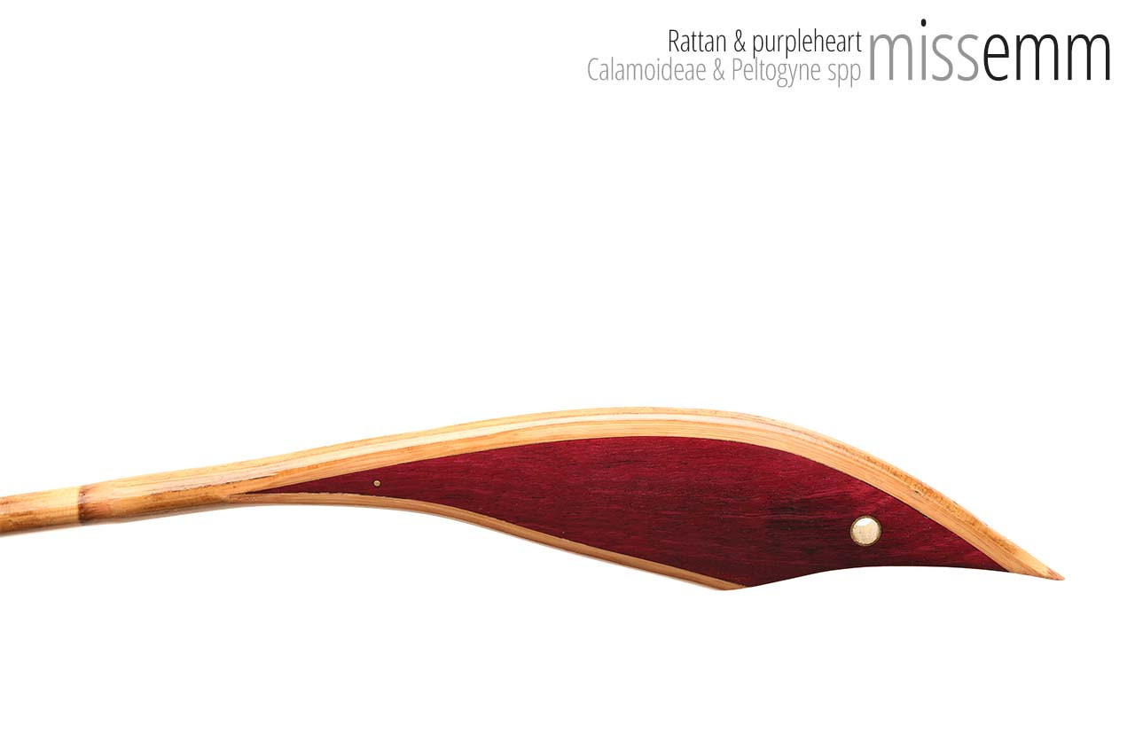 Handmade bdsm toys | Rattan cane | By kink artisan Miss Emm | The cane shaft is rattan cane and the handle has been handcrafted from purpleheart with brass details.