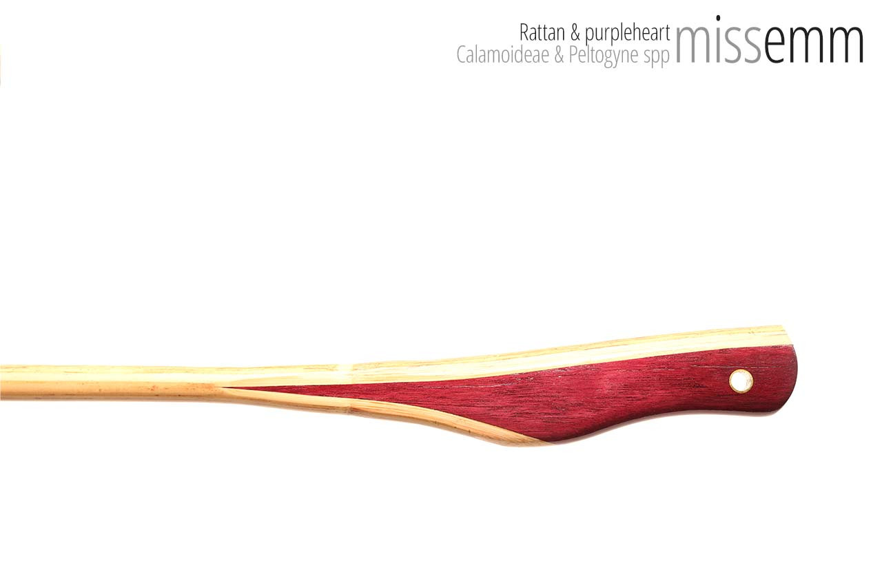 Handmade bdsm toys | Rattan cane | By kink artisan Miss Emm | The cane shaft is rattan cane and the handle has been handcrafted from purpleheart with brass details.