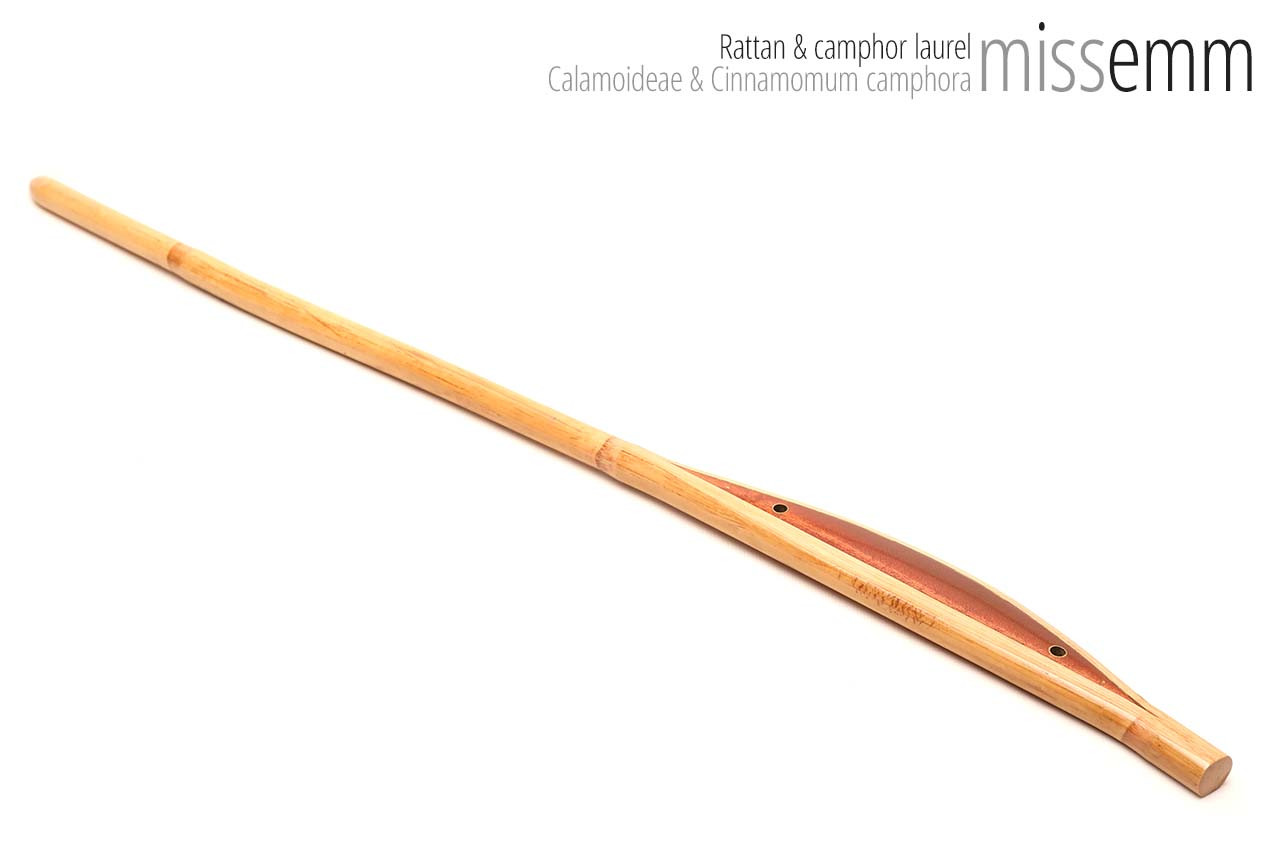 Handmade bdsm toys | Rattan cane | By kink artisan Miss Emm | The cane shaft is rattan cane and the handle has been handcrafted from mahogany with brass details.