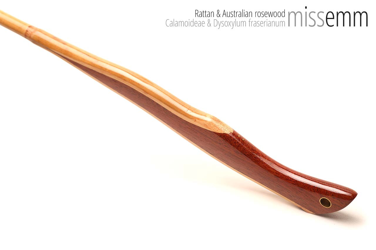 Handmade bdsm toys | Rattan cane | By kink artisan Miss Emm | The cane shaft is rattan cane and the handle has been handcrafted from Australian rosewood with brass details.