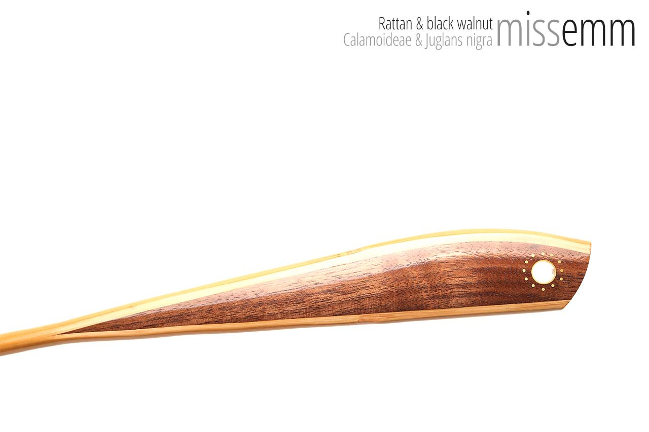 Handmade bdsm toys | Rattan cane | By kink artisan Miss Emm | The cane shaft is rattan cane and the handle has been handcrafted from black walnut with brass details.