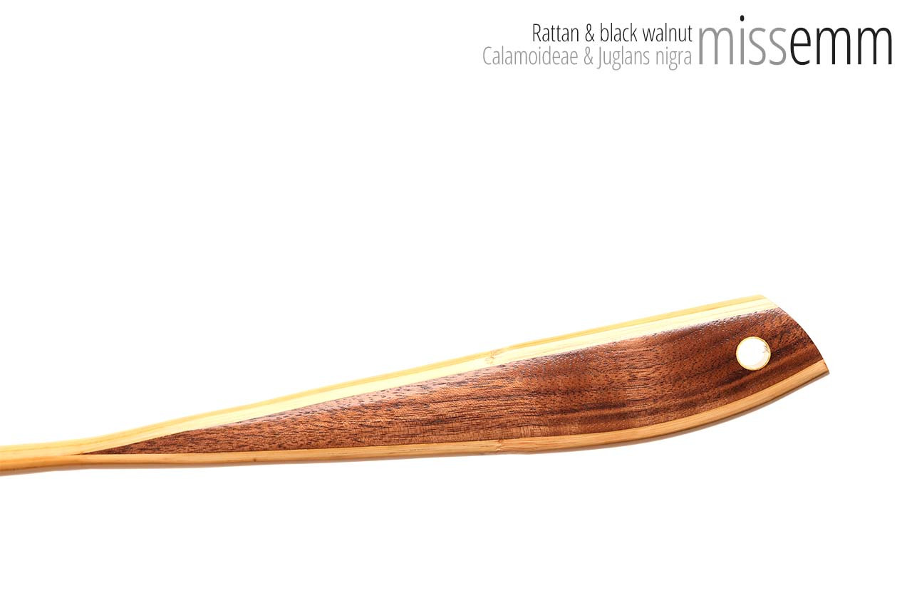 Handmade bdsm toys | Rattan cane | By kink artisan Miss Emm | The cane shaft is rattan cane and the handle has been handcrafted from black walnut with brass details.