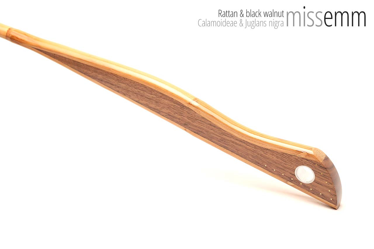 Handmade bdsm toys | Rattan cane | By kink artisan Miss Emm | The cane shaft is rattan cane and the handle has been handcrafted from black walnut with aluminium details.