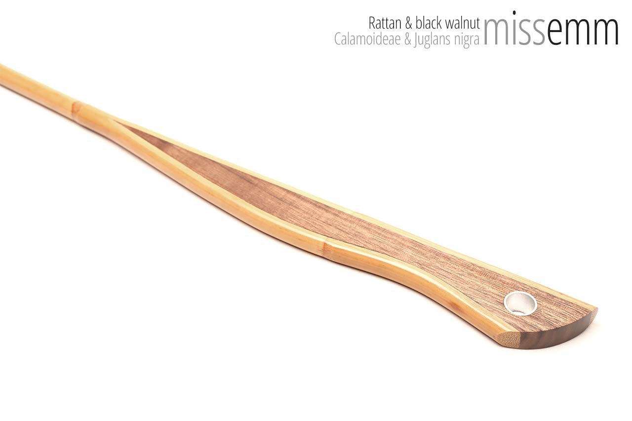 Handmade bdsm toys | Rattan cane | By kink artisan Miss Emm | The cane shaft is rattan cane and the handle has been handcrafted from black walnut with aluminium details.