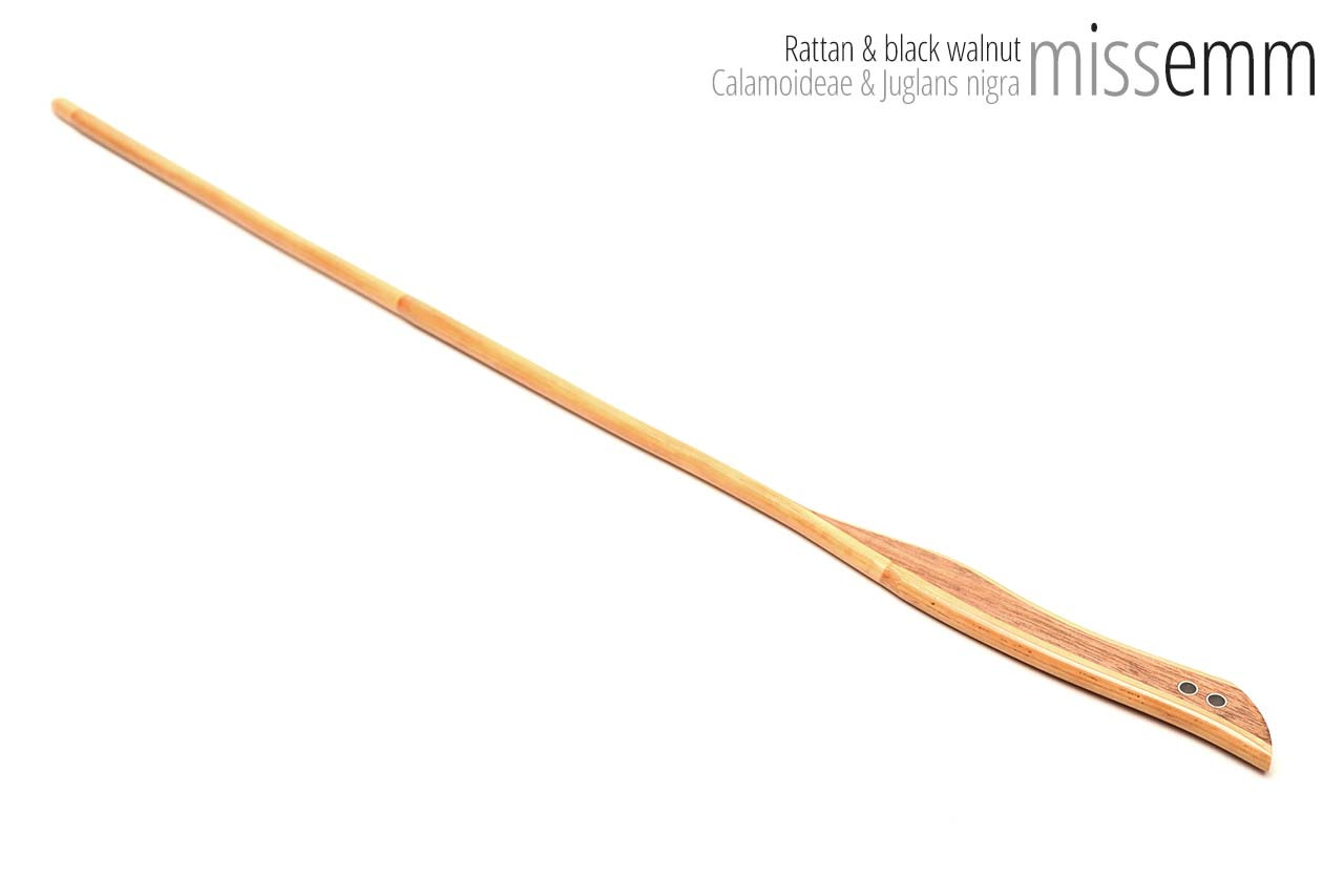 Handmade bdsm toys | Rattan cane | By kink artisan Miss Emm | The cane shaft is rattan cane and the handle has been handcrafted from black walnut with aluminium details.