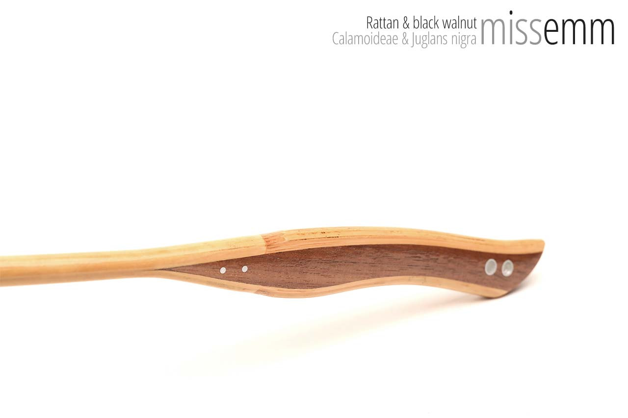 Handmade bdsm toys | Rattan cane | By kink artisan Miss Emm | The cane shaft is rattan cane and the handle has been handcrafted from black walnut with aluminium details.