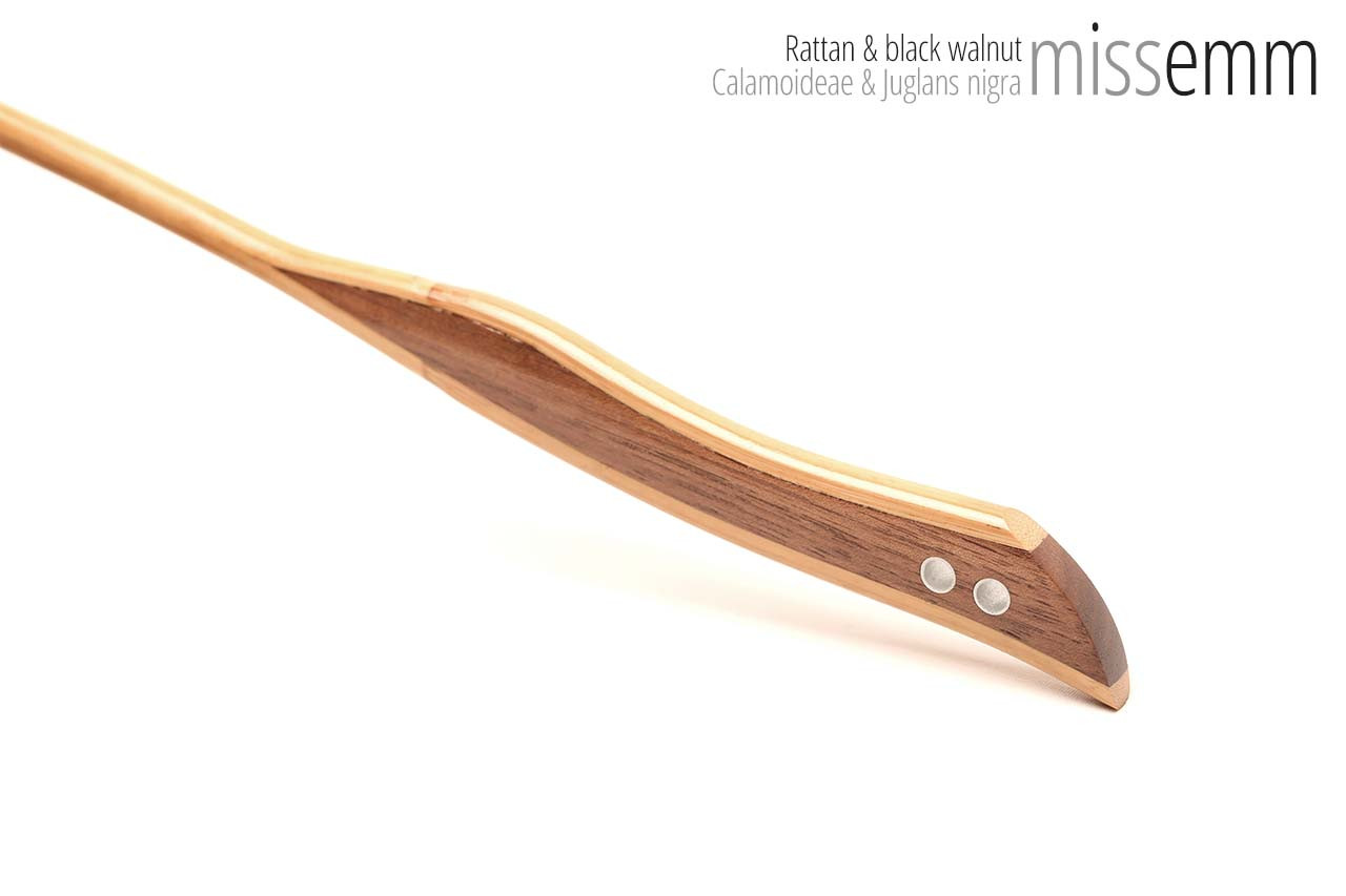 Handmade bdsm toys | Rattan cane | By kink artisan Miss Emm | The cane shaft is rattan cane and the handle has been handcrafted from black walnut with aluminium details.