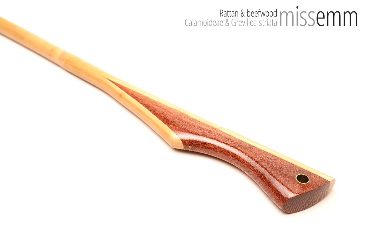 Handmade bdsm toys | Rattan cane | By kink artisan Miss Emm | The cane shaft is rattan cane and the handle has been handcrafted from beefwood with brass details.