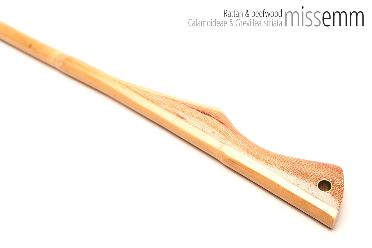 Handmade bdsm toys | Rattan cane | By kink artisan Miss Emm | The cane shaft is rattan cane and the handle has been handcrafted from beefwood with brass details.