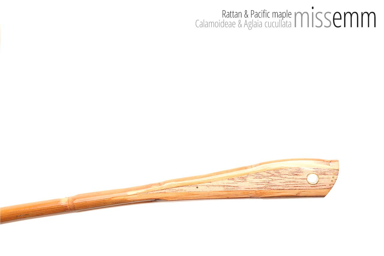 Handmade bdsm toys | Rattan cane | By kink artisan Miss Emm | The cane shaft is rattan cane and the handle has been handcrafted from Pacific maple with brass details.