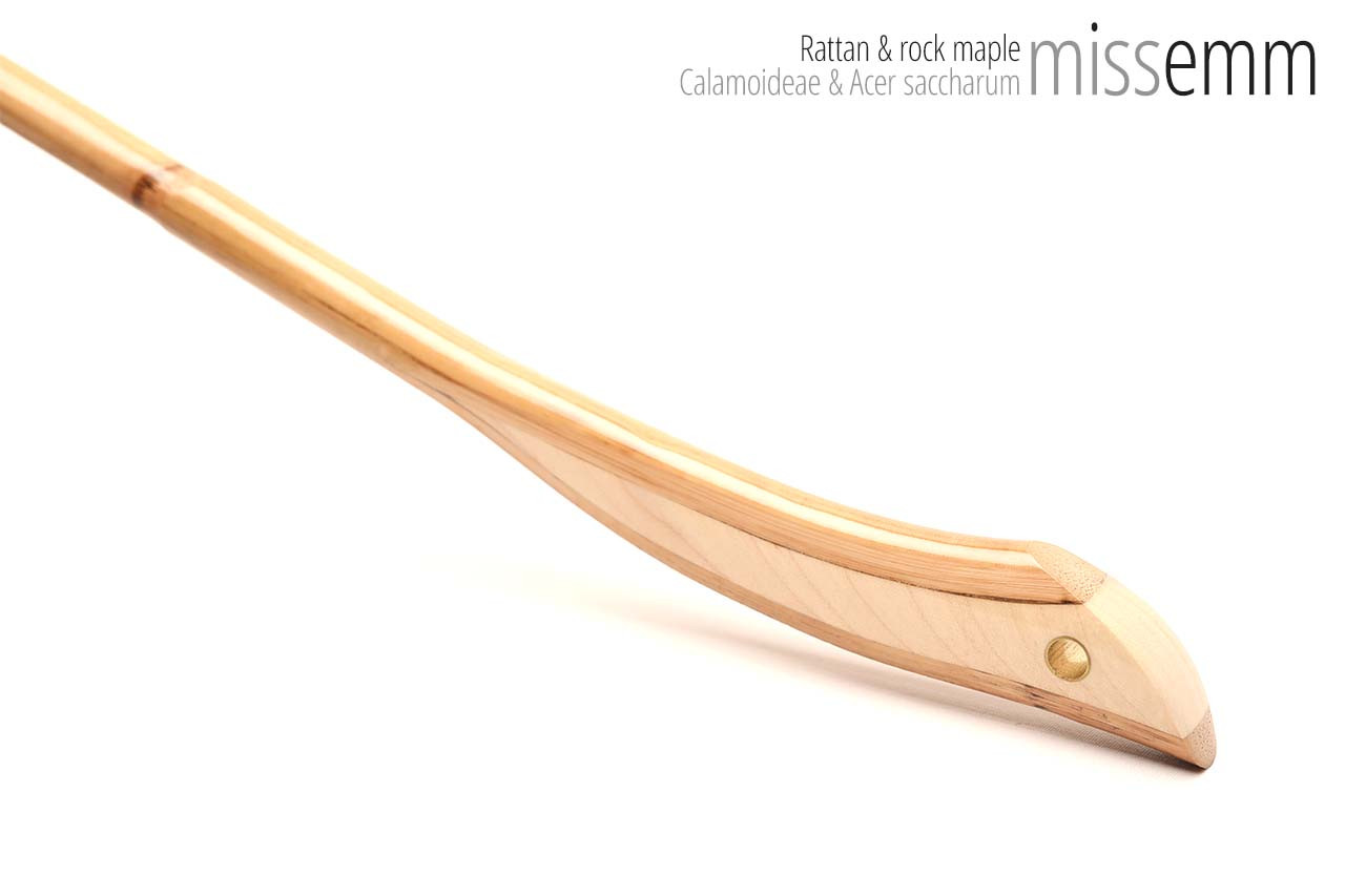 Handmade bdsm toys | Rattan cane | By kink artisan Miss Emm | The cane shaft is rattan cane and the handle has been handcrafted from rock maple with brass details.
