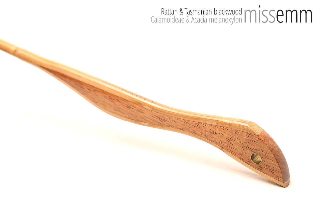 Handmade bdsm toys | Rattan cane | By kink artisan Miss Emm | The cane shaft is rattan cane and the handle has been handcrafted from Tasmanian blackwood with brass details.